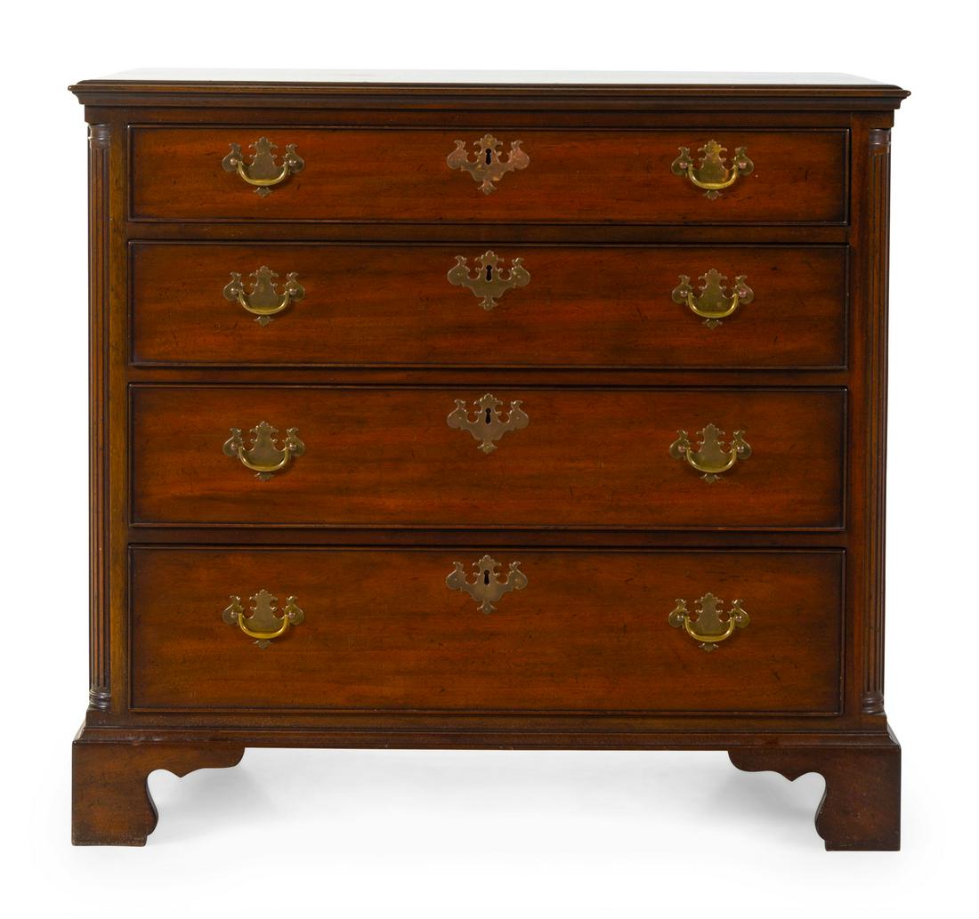 A Chippendale Style Mahogany Chest of Drawers : A Chippendale Style Mahogany Chest of Drawers Height 35 1/2 x width 38 1/2 x depth 20 inches. Provenance: Property from the Collection of Marion and Henry Bloch, Kansas City, Missouri