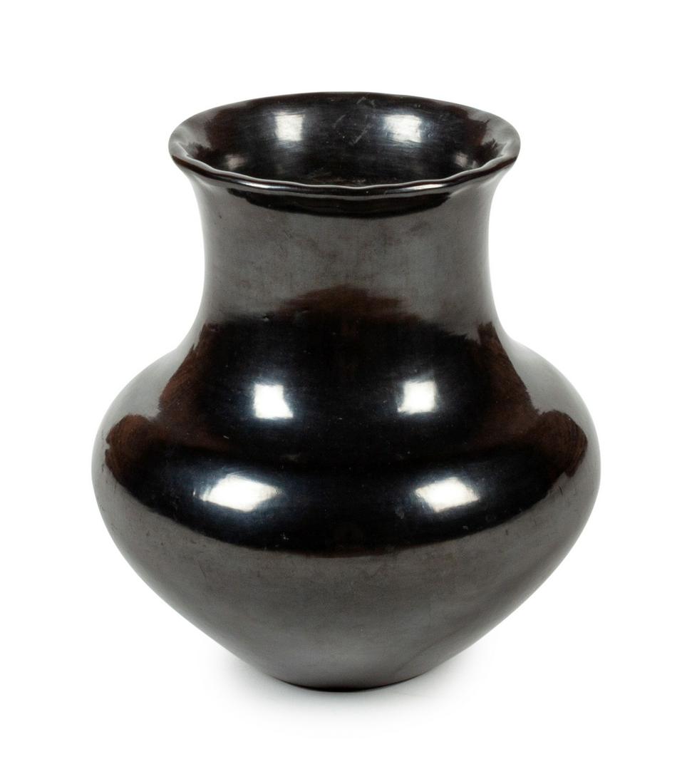 Maria Martinez (San Ildefonso, 1887-1980) Blackware: Maria Martinez (San Ildefonso, 1887-1980) Blackware Jar height 9 3/4 x diameter 8 inches Provenance: