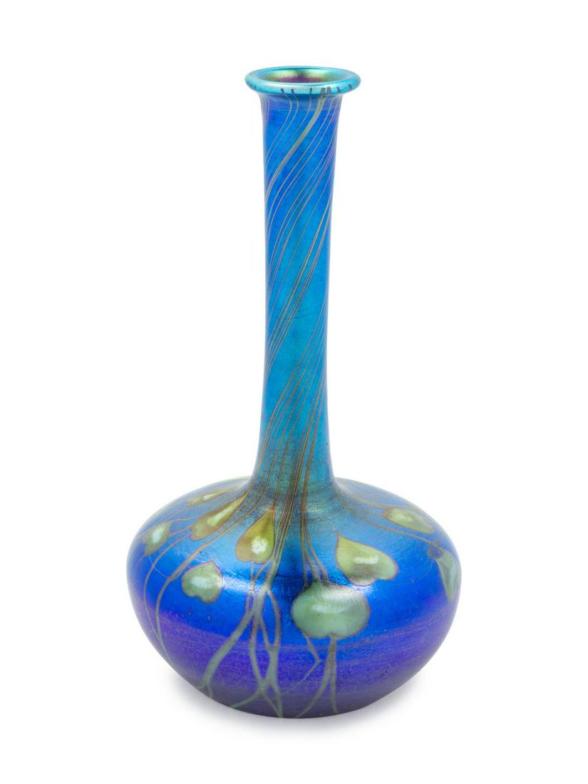 Tiffany Studios American, Early 20th Century Stemmed: Tiffany Studios American, Early 20th Century Stemmed Vase, c. 1900 Favrile glass inscribed on underside with applied manufacturer's label H 6 3/8 x Diameter 3 1/2 inches Property from the Art Institut