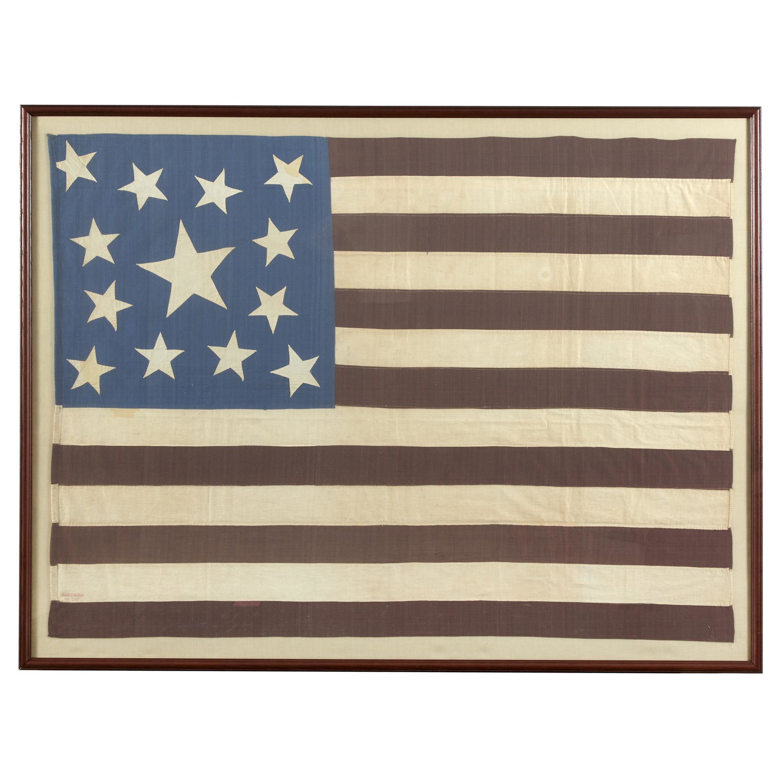A 13-Star American Flag, circa 1876: A 13-Star American Flag, circa 1876 Hand-sewn, double appliqued cotton stars arranged in a wreath or medallion of 8 stars enclosing a larger star with 4 corner stars on a hand-sewn cotton canton, with