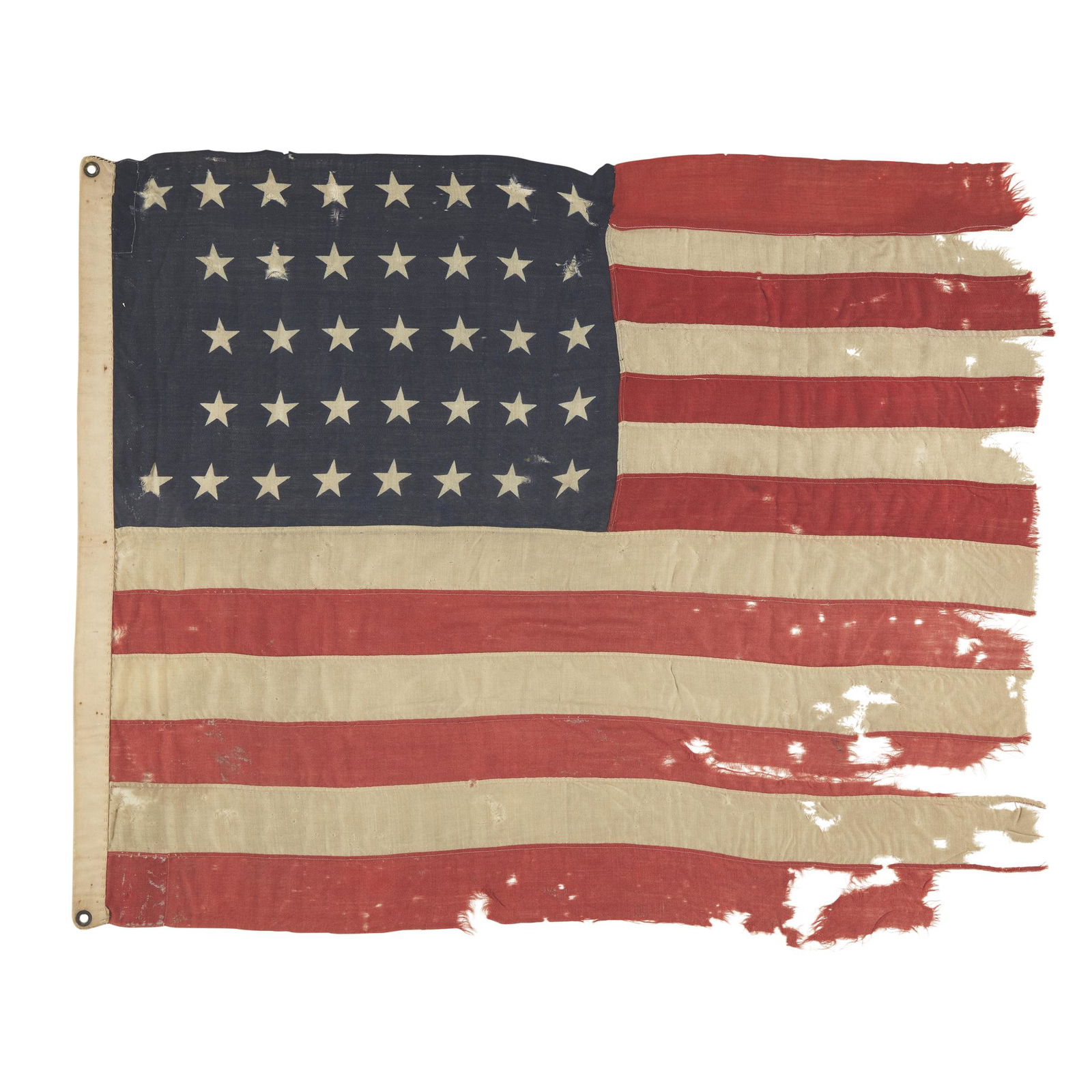 A 37-Star American Flag associated with Native American: A 37-Star American Flag associated with Native American Modoc Chief Kintpuash, also known as "Captain Jack," circa 1867 Clamp-dyed stars arranged in horizontal rows of 8,7,7,7,8 on a wool canton, mach