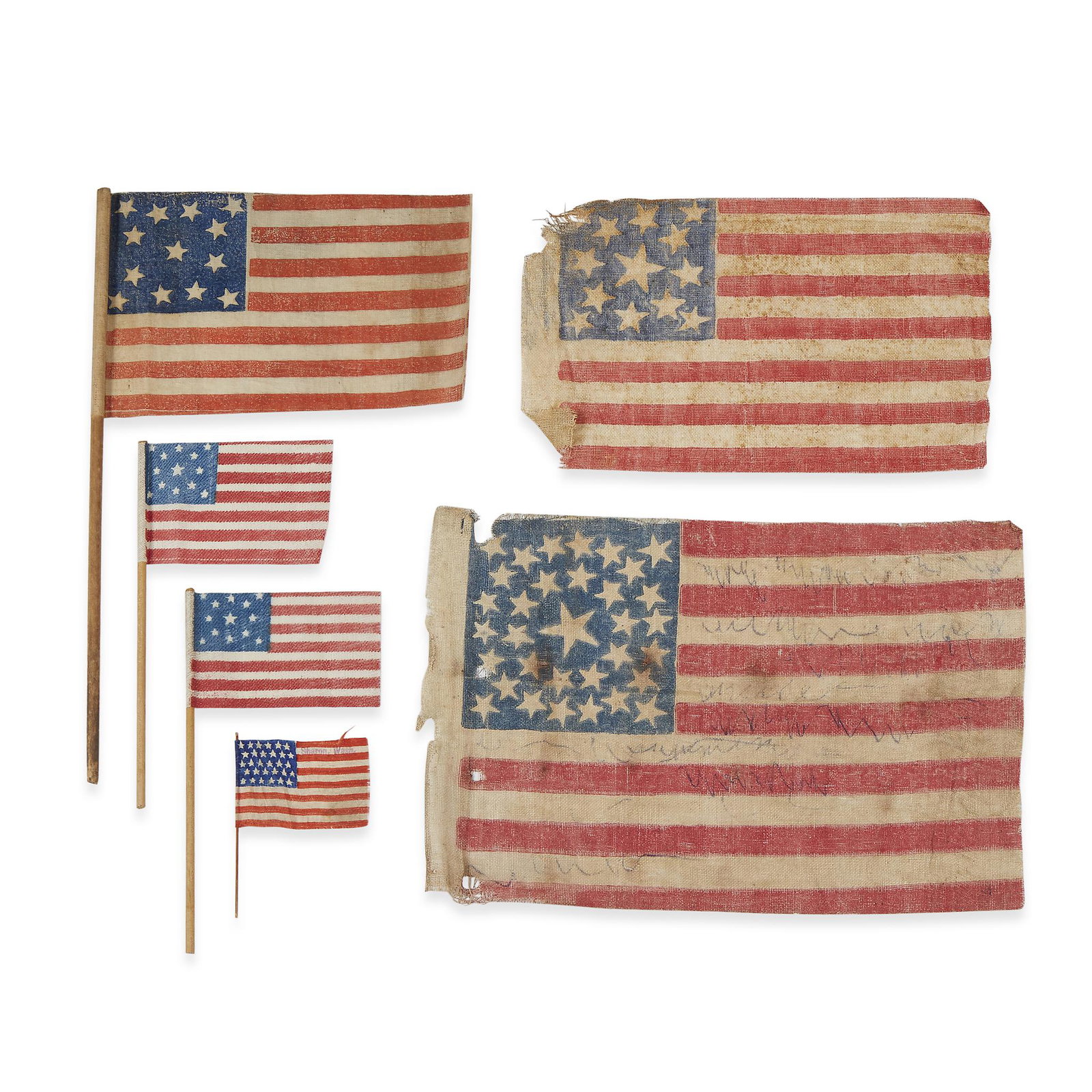 Six American parade Flags, 1860-1900: Six American parade Flags, 1860-1900 Including four 13-Star American parade Flags printed on cotton in a medallion pattern, three having original poles; a 30-Star woven lapel pin bearing stamp, "Sharo