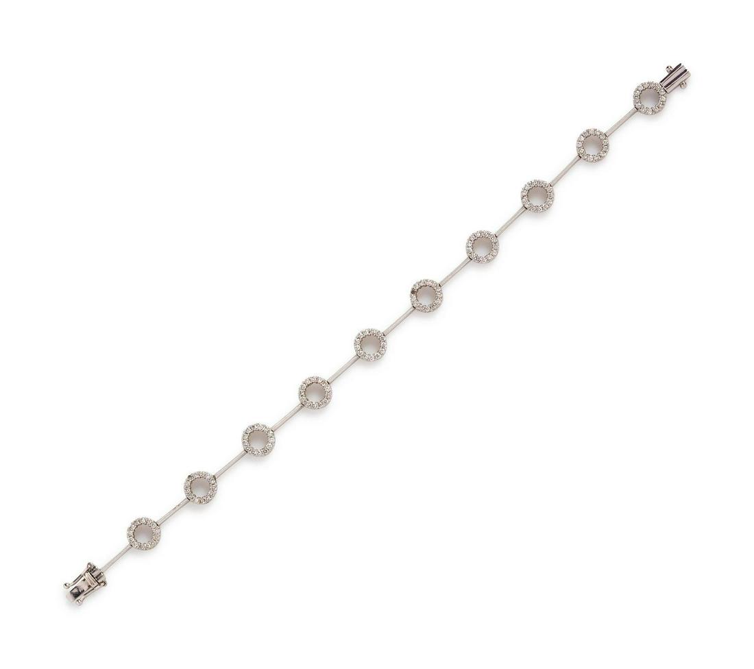 A 14 Karat White Gold and Diamond Bracelet,: A 14 Karat White Gold and Diamond Bracelet, containing 130 round brilliant cut diamonds weighing approximately 1.00 carat total. Stamp: HK 14K. 5.10 dwts. Provenance: