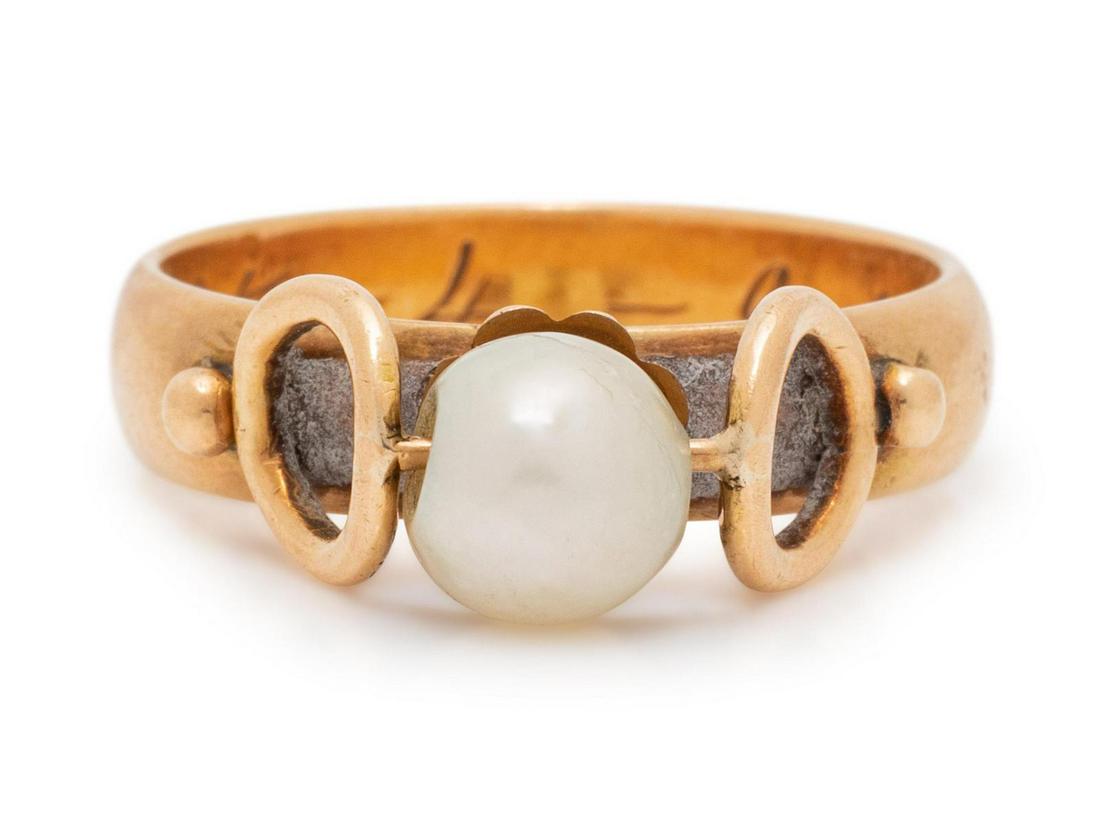 An Edwardian Yellow Gold and Pearl Ring,: An Edwardian Yellow Gold and Pearl Ring, containing one pearl (origin not tested) measuring approximately 5.95 mm in diameter. Engraved: 27-4-906. 2.80 dwts. Provenance: