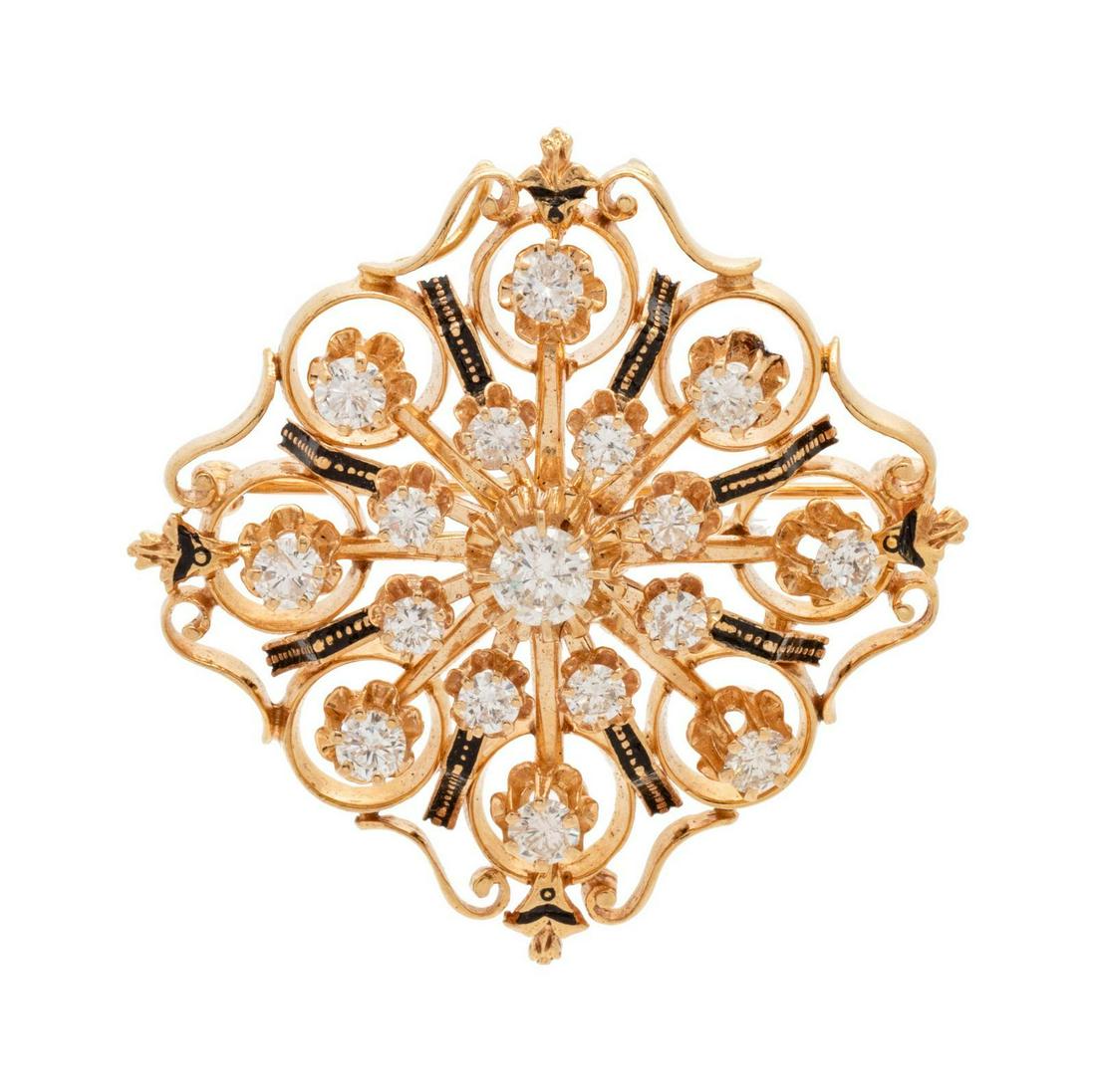 A 14 Karat Yellow Gold, Diamond and Enamel: A 14 Karat Yellow Gold, Diamond and Enamel Pendant/Brooch, containing 17 round brilliant cut diamonds weighing approximately 1.70 carats total in an open filigree design with black enamel accents. Sta