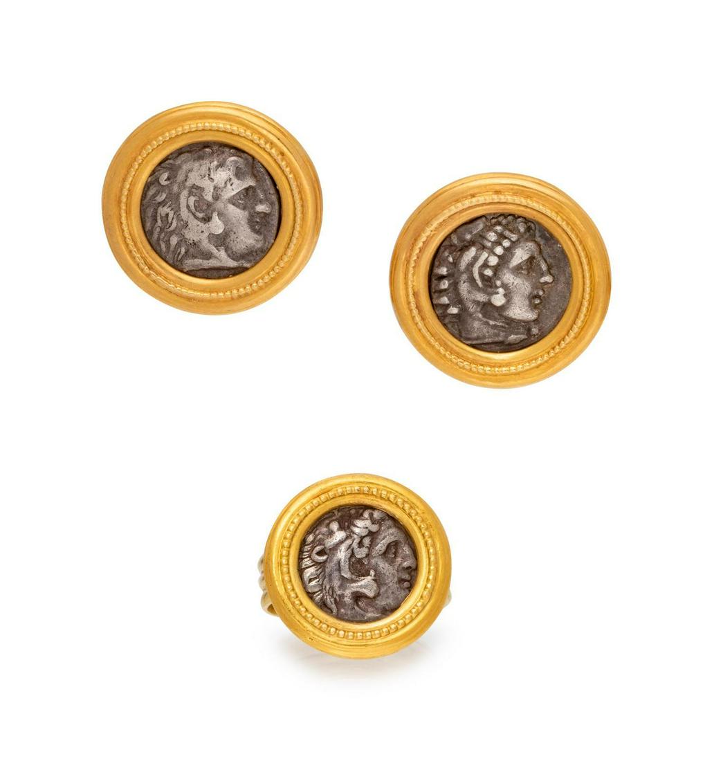 A Yellow Gold and Roman Coin Demi-Parure,: A Yellow Gold and Roman Coin Demi-Parure, consisting of a ring containing one Roman coin, together with a pair of earclips containing two Roman coins, posts with clip backs. Ring stamp: 18K 22K. Clip 