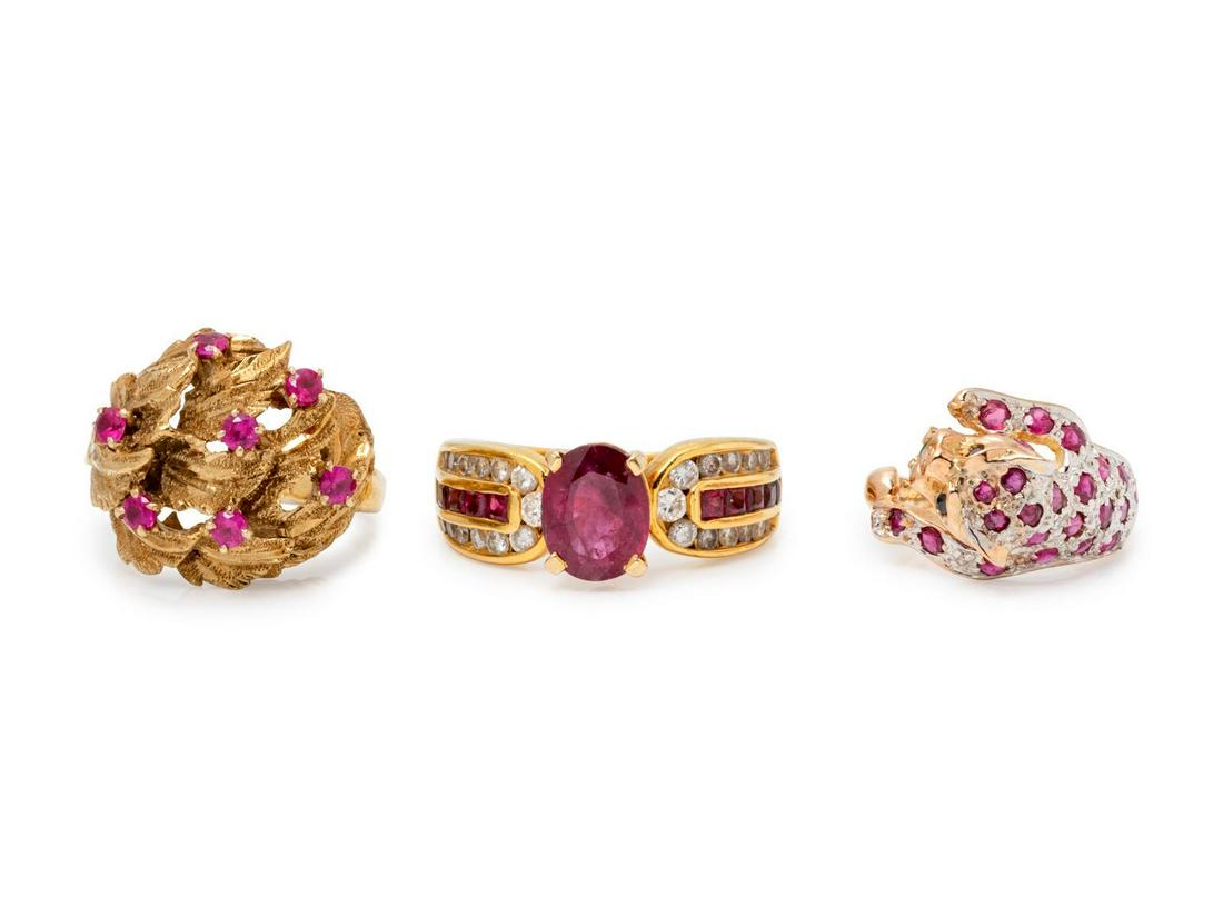 A Collection of Yellow Gold and Ruby Rings,: A Collection of Yellow Gold and Ruby Rings, consisting of an 18 karat ring containing one oval shape ruby measuring approximately 9.05 x 7.15 x 4.30 mm, 26 round brilliant cut diamonds weighing approx