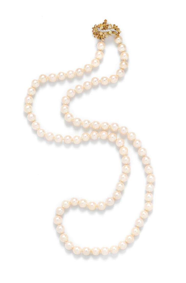An 18 Karat Bicolor Gold, Cultured Pearl, Colored: An 18 Karat Bicolor Gold, Cultured Pearl, Colored Diamond and Diamond Necklace, containing 81 pearls measuring approximately 9.00-9.50 mm, strung knotted, with approximately 51 round brilliant cut col