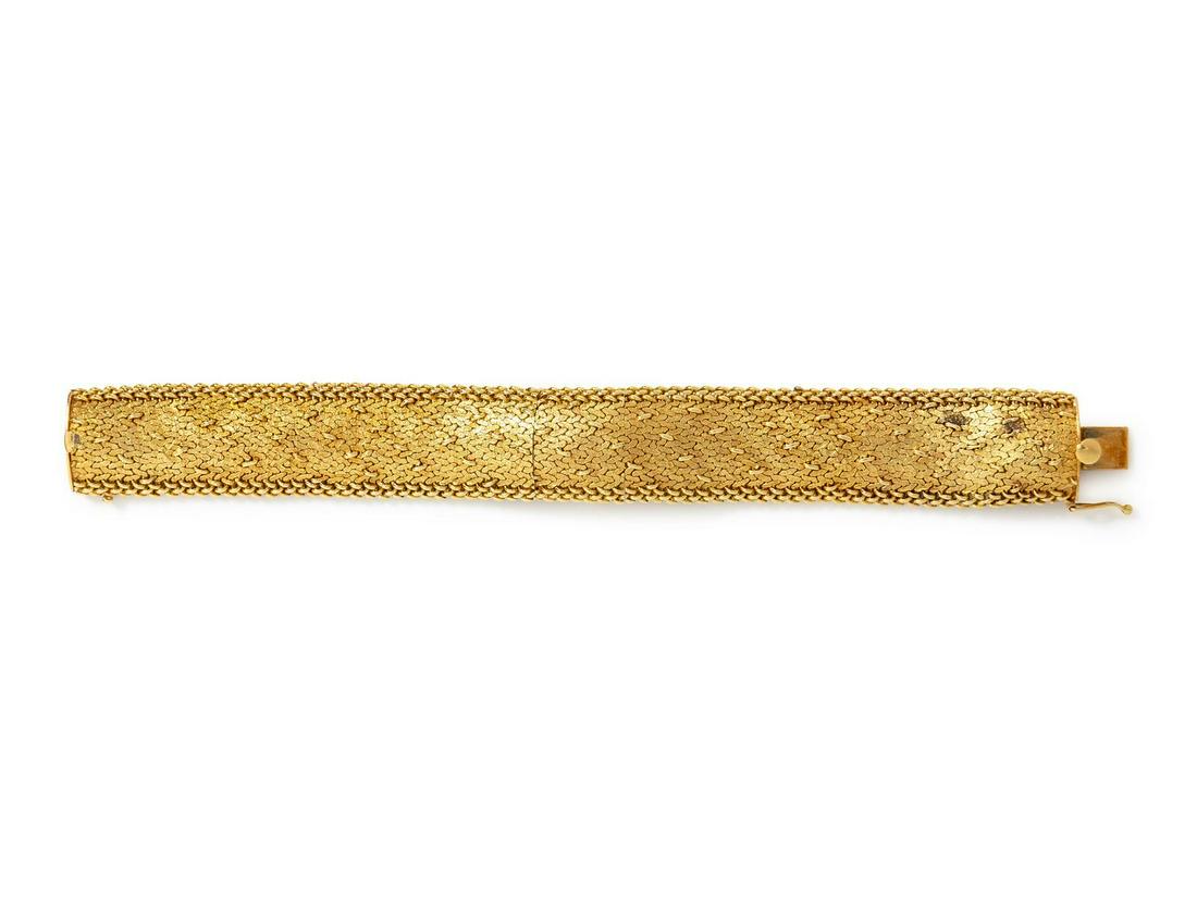 A 14 Karat Yellow Gold Surprise Wristwatch, Jean: A 14 Karat Yellow Gold Surprise Wristwatch, Jean Claude, 15.00 x 17.00 case dimensions with a hinged case cover, matte silvered dial signed Jean Claude, applied dot and baton numerals, radium hands, m