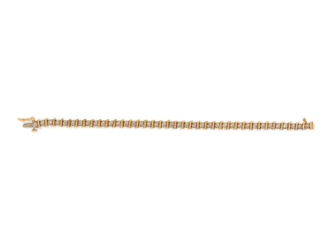 A 14 Karat Yellow Gold and Diamond Bracelet,: A 14 Karat Yellow Gold and Diamond Bracelet, containing 37 round brilliant cut diamonds weighing approximately 3.00 carats total. Stamp: M 14K 3TW. 8.15 dwts. Provenance: