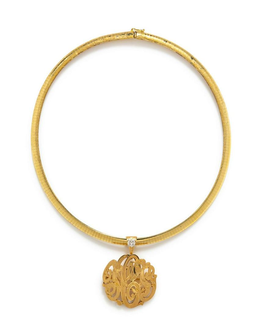 A 14 Karat Yellow Gold Monogram Pendant/Necklace,: A 14 Karat Yellow Gold Monogram Pendant/Necklace, consisting of a pendant/brooch containing one round brilliant cut diamond weighing approximately 0.55 carat, suspended from an omega chain necklace me