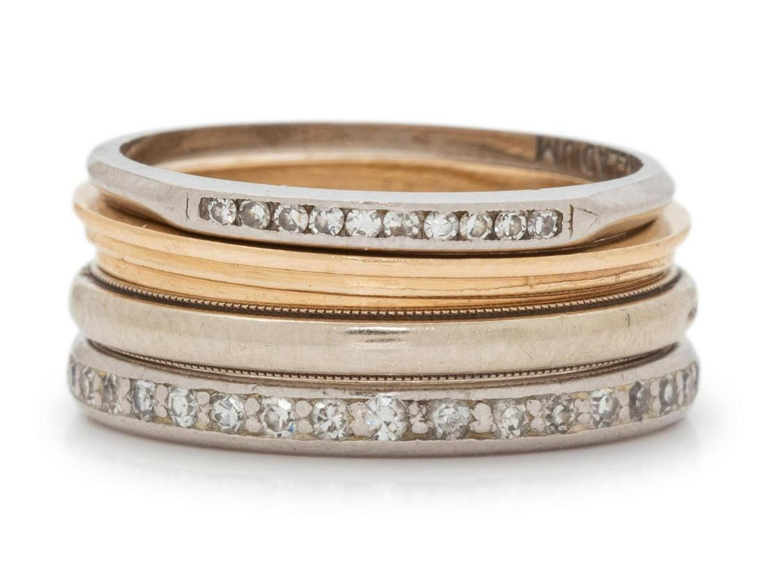 A Collection of Rings, : A Collection of Rings, consisting of a platinum ring containing numerous round single cut diamonds, a 14 karat yellow gold band, a 14 karat white gold band, together with a palladium ring containing