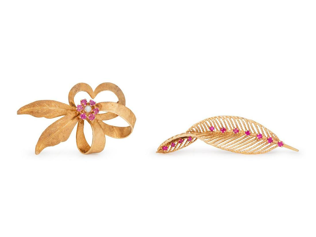A Collection of 14 Karat Yellow Gold and Ruby Brooches,: A Collection of 14 Karat Yellow Gold and Ruby Brooches, consisting of a leaf motif brooch containing 11 round mixed cut rubies, together with a ribbon and leaf motif brooch containing six round mixed