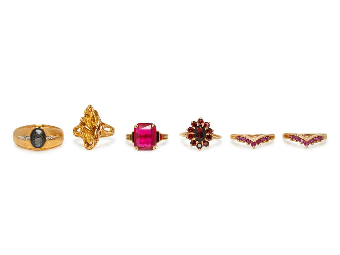 A Collection of Yellow Gold and Gemstone Rings,: A Collection of Yellow Gold and Gemstone Rings, consisting of a 14 karat gold, oval cabochon cut black sapphire and diamond ring, a 14 karat gold nugget ring, a 14 karat gold, enamel and synthetic rub