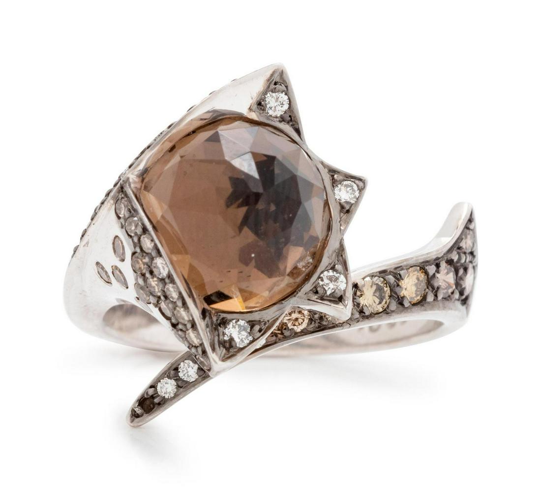 An 18 Karat White Gold, Smoky Quartz, Diamond and: An 18 Karat White Gold, Smoky Quartz, Diamond and Colored Diamond Ring, containing one round faceted smoky quartz measuring approximately 9.50 mm and numerous round brilliant cut diamonds and colored 