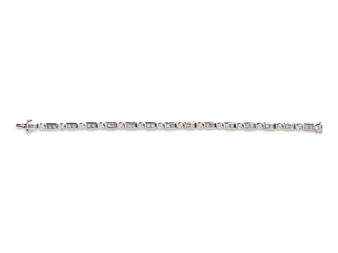 A 14 Karat White Gold and Diamond Bracelet, Kwiat, : A 14 Karat White Gold and Diamond Bracelet, Kwiat, containing 15 round brilliant cut diamonds weighing approximately 0.75 carat total and 30 princess cut diamonds weighing approximately 3.00 carats 