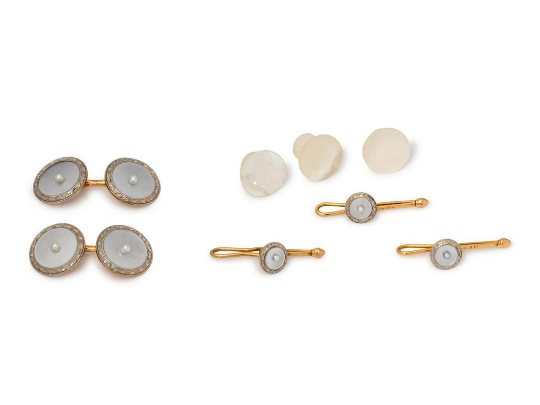 An Art Deco Platinum Topped 14 Karat Yellow Gold,: An Art Deco Platinum Topped 14 Karat Yellow Gold, Cultured Pearl and Mother-of-Pearl Dress Set, Krementz, consisting of a pair of cufflinks, three shirt studs and three mother-of-pearl vest studs. S