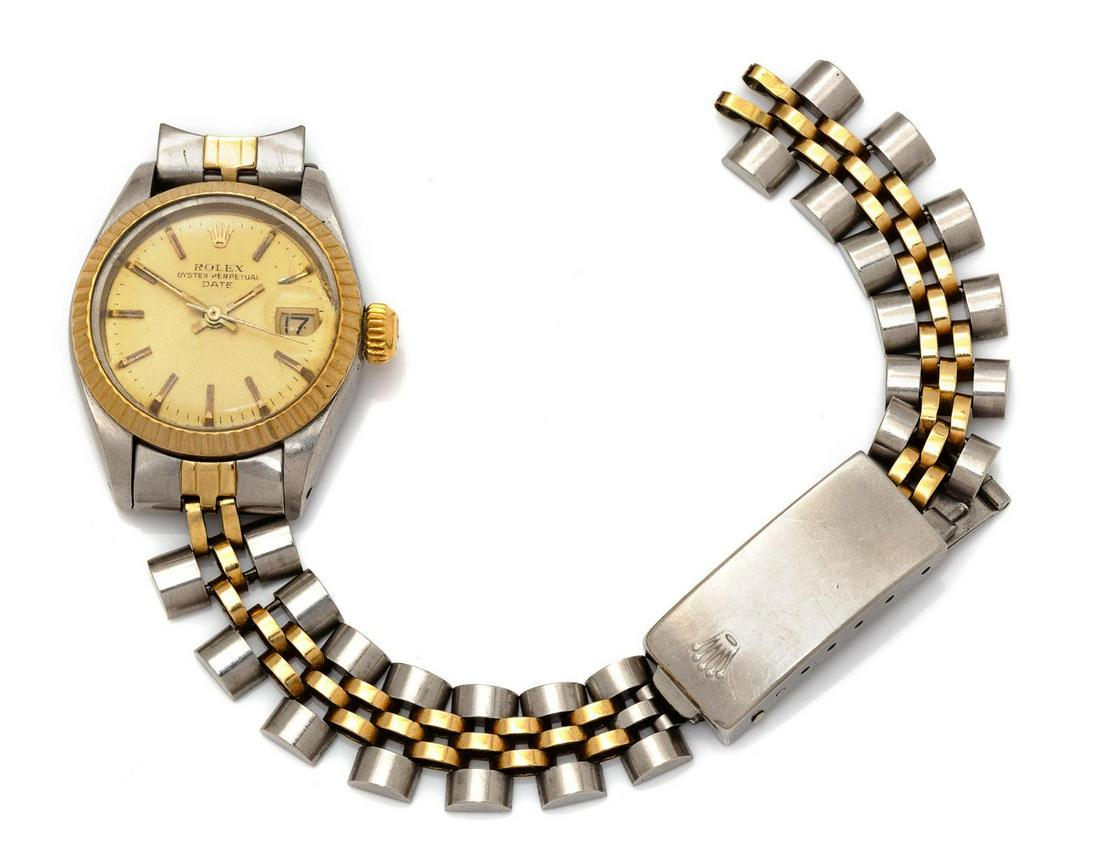 Rolex, Yellow Gold and Stainless Steel Ref. 6914: Rolex, Yellow Gold and Stainless Steel Ref. 6914 'Oyster Perpetual' Wristwatch 25.00 mm case diameter, matte gold dial signed ROLEX, applied gold baton numerals, luminous gold baton hands with center 