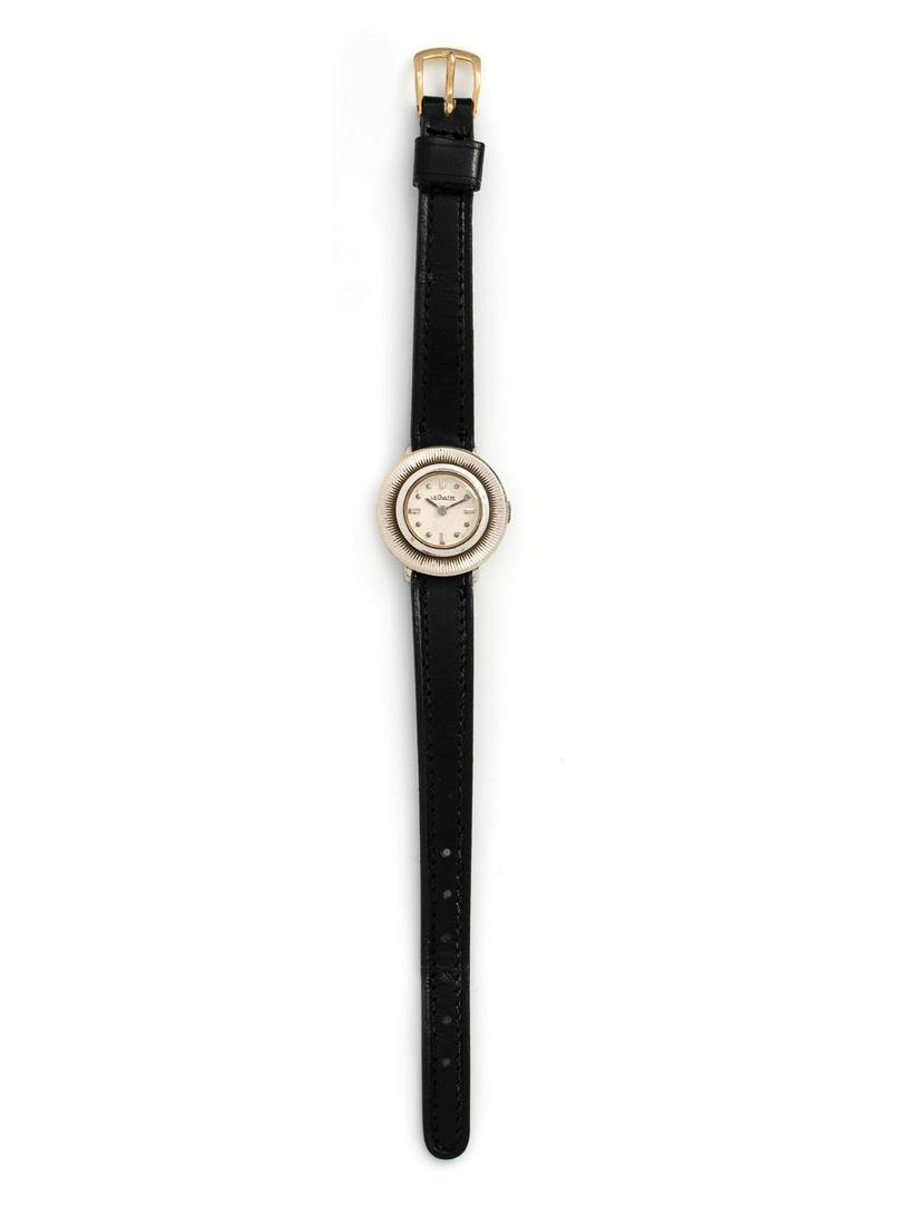 A 14 Karat White Gold Wristwatch, Jaeger-LeCoultre,: A 14 Karat White Gold Wristwatch, Jaeger-LeCoultre, 21.00 mm case diameter, matte silvered dial signed LECOULTRE, applied bar and dot numerals, sword hands, snap on case back, 17 jewel manual wind mov