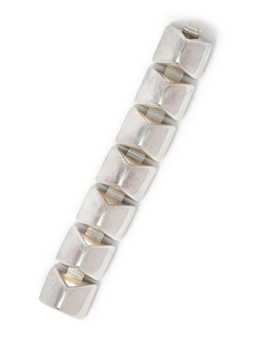 A Sterling Silver Bracelet, Nanna Ditzel for Georg: A Sterling Silver Bracelet, Nanna Ditzel for Georg Jensen, consisting of seven sculptural geometric links with connector links. Stamp: 925 S DENMARK (maker's mark) 139. 77.80 dwts. Provenance: