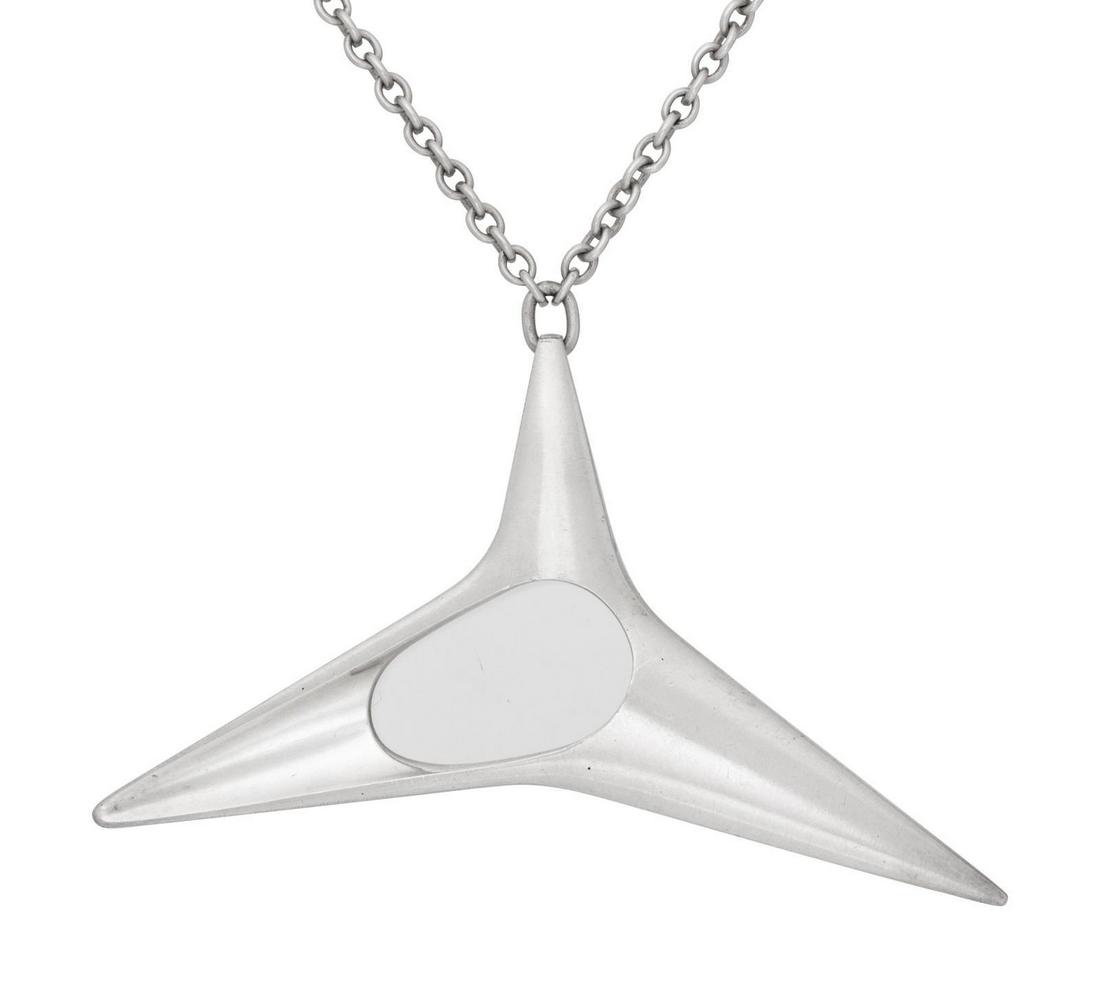 A Sterling Silver Pendant/Necklace, Henning Koppel for: A Sterling Silver Pendant/Necklace, Henning Koppel for Georg Jensen, consisting of an abstract sculptural pendant suspended from a cable link chain necklace. Pendant stamp: (maker's mark) HK STERLIN