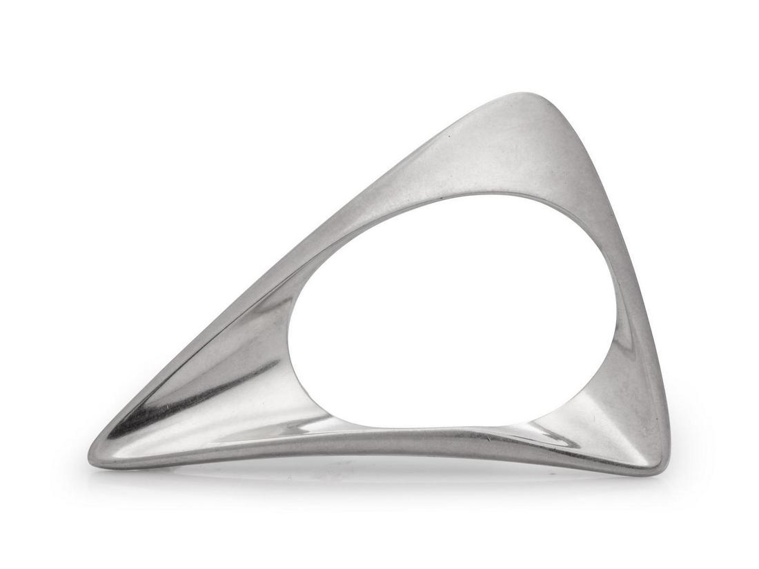 A Modernist Sterling Silver Brooch, Henning Koppel for: A Modernist Sterling Silver Brooch, Henning Koppel for Georg Jensen, in an open biomorphic design. Stamp: 925 S DENMARK (maker's mark) 375. 13.50 dwts. Provenance: