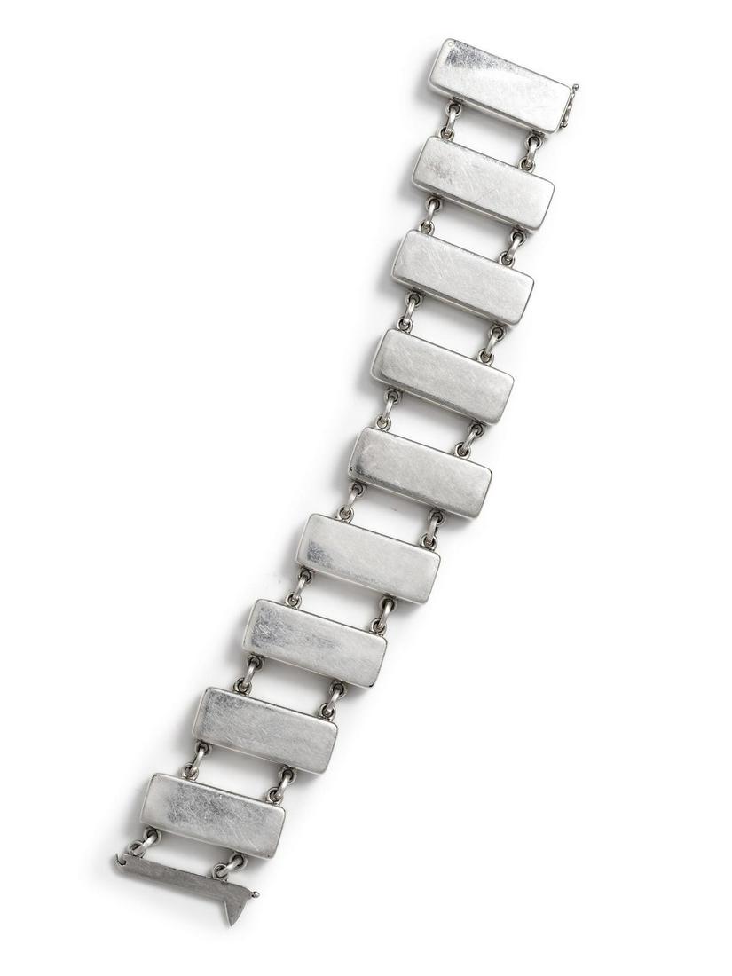 A Sterling Silver Bracelet, Astrid Fog for Georg: A Sterling Silver Bracelet, Astrid Fog for Georg Jensen, consisting of nine rectangular links with connector chain links. Stamp: 925 S DENMARK (maker's mark) 184. 51.90 dwts. Provenance: