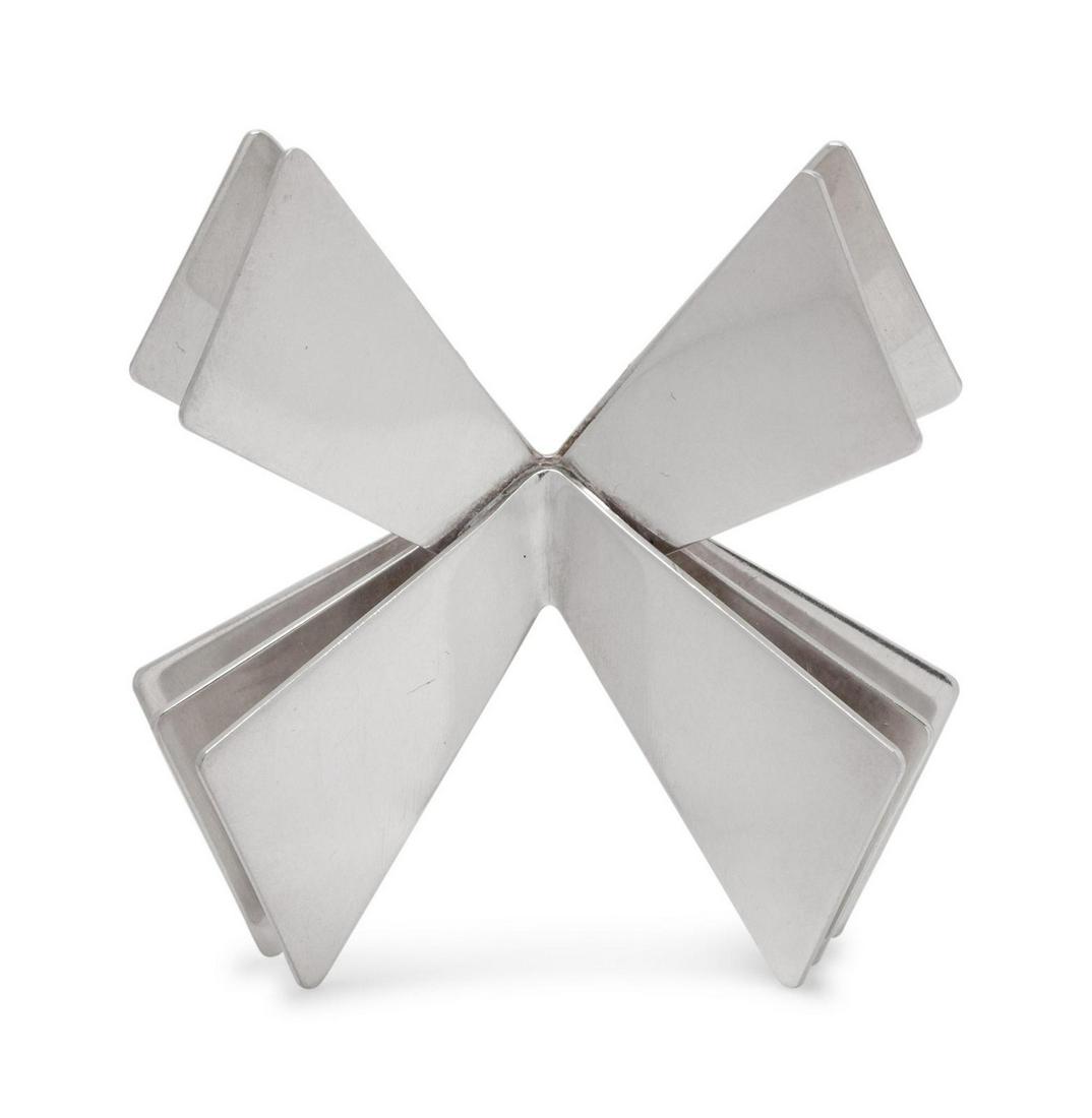 A Modernist Sterling Silver Brooch, Nanna Ditzel for: A Modernist Sterling Silver Brooch, Nanna Ditzel for Georg Jensen, designed as a multi-layer stylized X motif. Stamp: (maker's mark) 925 S DENMARK 335. 21.80 dwts. Provenance: