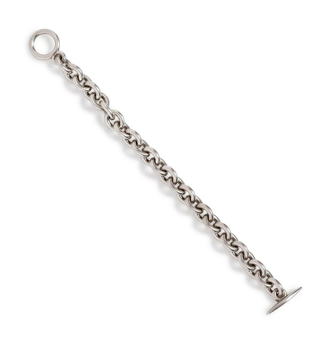 A Sterling Silver Bracelet, Nanna Ditzel for Georg: A Sterling Silver Bracelet, Nanna Ditzel for Georg Jensen, consisting of a cable link bracelet measuring approximately 10.90 mm wide, with toggle clasp. Stamp: STERLING DENMARK 140 B (maker's mark). 3