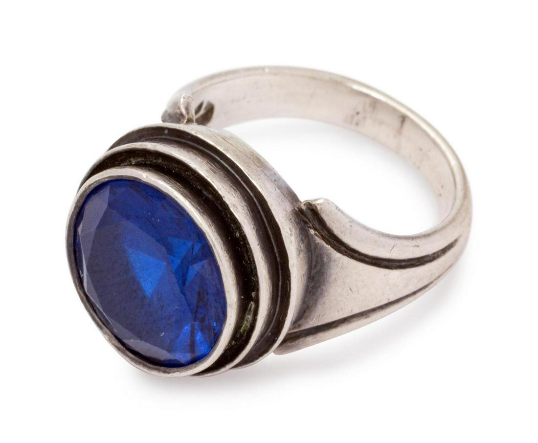 A Sterling Silver and Synthetic Blue Spinel Ring, Kalo,: A Sterling Silver and Synthetic Blue Spinel Ring, Kalo, containing one round mixed cut synthetic blue spinel measuring approximately 11.60 mm in diameter. Stamp: STERLING KALO HAND WROUGHT. 7.00 dwts.