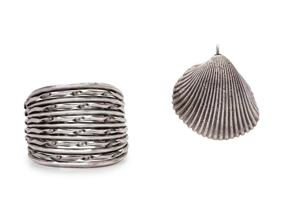A Collection of Silver Jewelry, : A Collection of Silver Jewelry, consisting of a cuff bracelet with alternating twisted and ridged wire, together with a sterling silver seashell pendant. Stamp: STERLING. 105.60 dwts. Provenance: