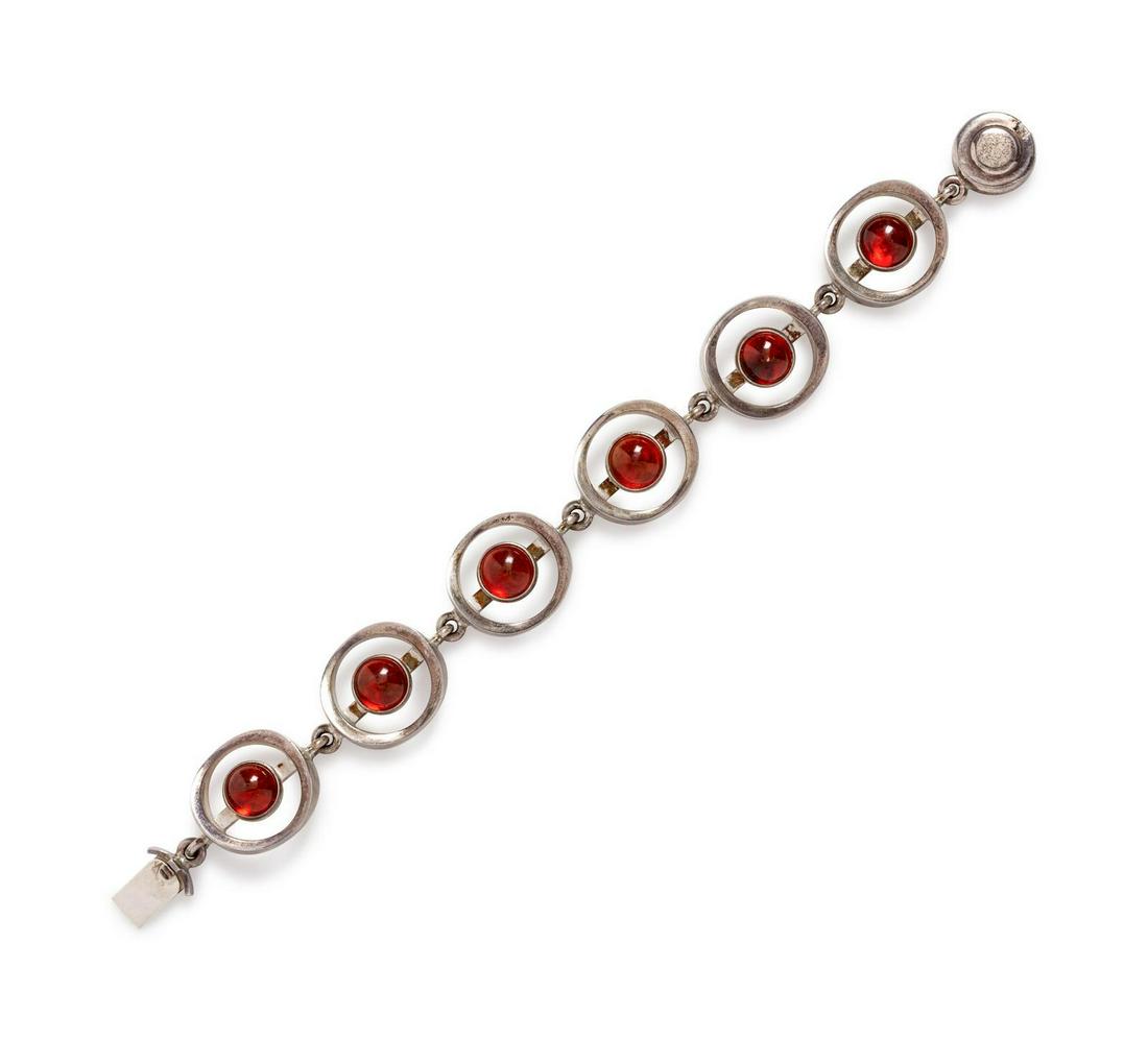 A Sterling Silver and Amber Bracelet, Niels Erik From,: A Sterling Silver and Amber Bracelet, Niels Erik From, containing six round cabochon cut amber measuring approximately 8.20 mm in diameter. Stamp: STERLING DENMARK NE FROM 925 S. 35.15 dwts. Provenanc