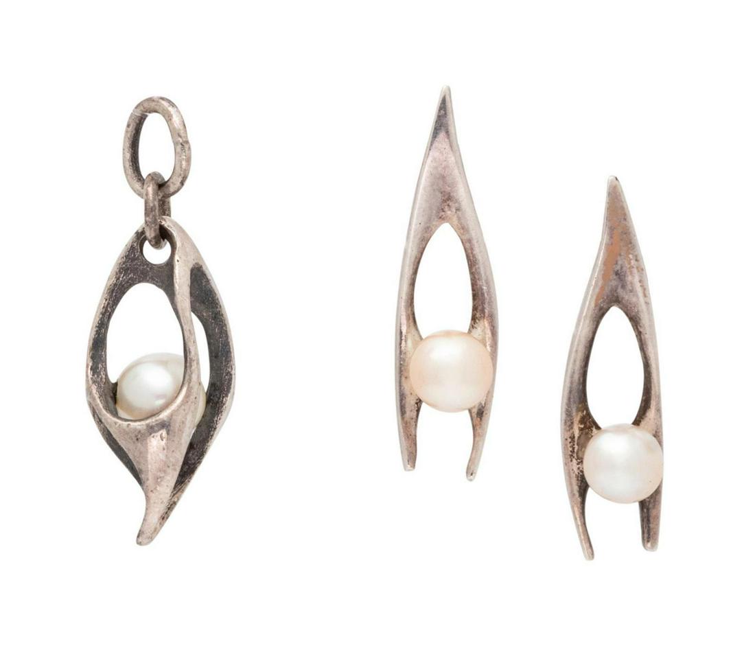 A Silver and Cultured Pearl Demi-Parure, Ed Wiener,: A Silver and Cultured Pearl Demi-Parure, Ed Wiener, unsigned, consisting of a free form pendant containing one pearl measuring approximately 5.95 mm in diameter, together with a pair of sculptural ear
