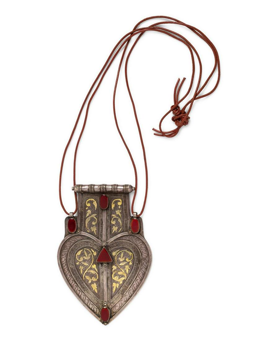 A Silver Middle Eastern Pendant,: A Silver Middle Eastern Pendant, containing five oval and triangular hardstone and foliate motif designs, the pendant measuring approximately 4 1/4 x 6 1/2 inches. 70.65 dwts. Provenance: