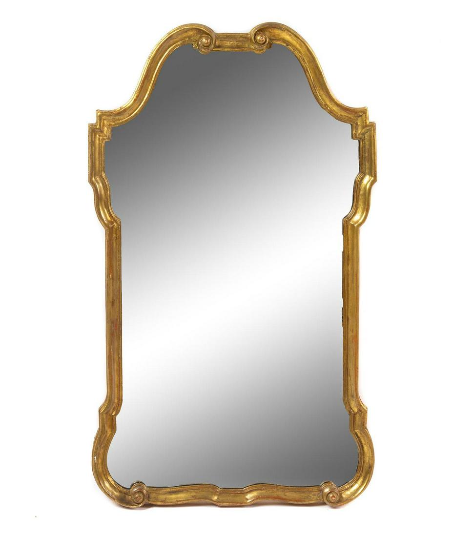 A Giltwood Mirror: A Giltwood Mirror 20th Century Height 40 7/8 x width 24 inches. Property from the Collection of Marion and Henry Bloch, Kansas City, Missouri