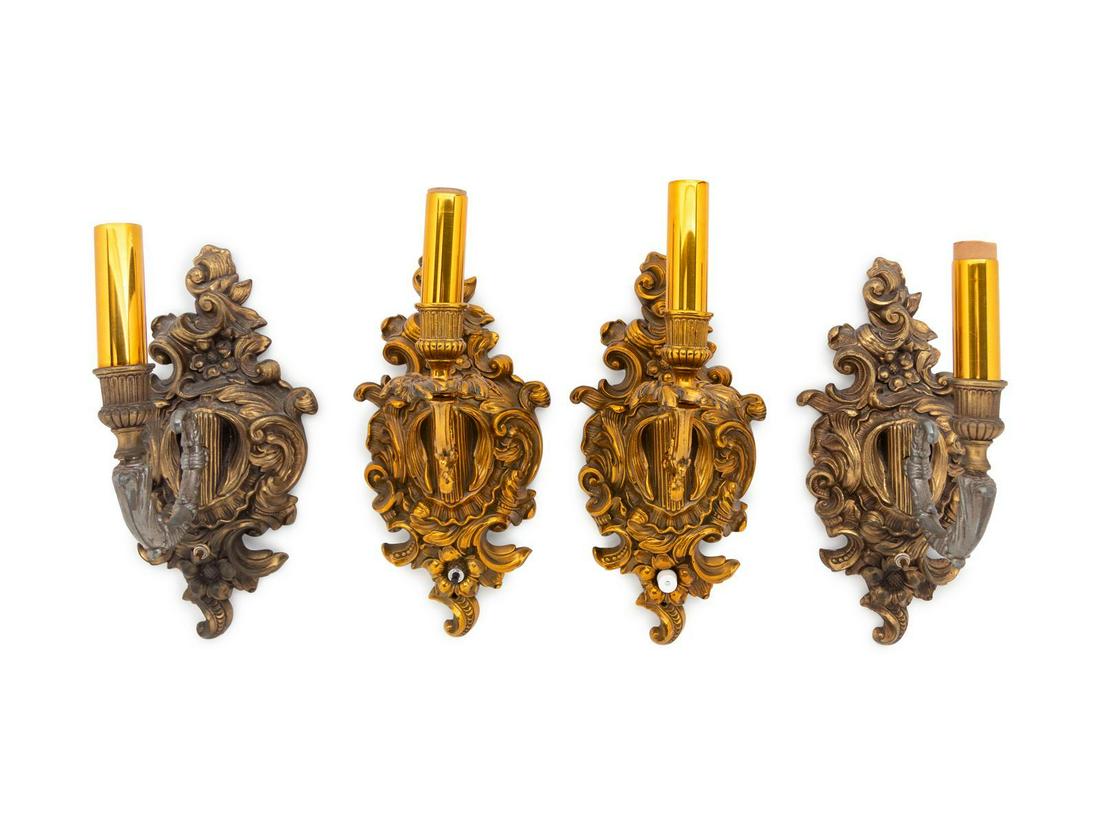 A Set of Four Rococo Style Gilt Metal Single-Light: A Set of Four Rococo Style Gilt Metal Single-Light Sconces Height 15 1/2 inches. Property from the Collection of Howard Kornacki and Sebastian Reyes, Evanston, Illinois