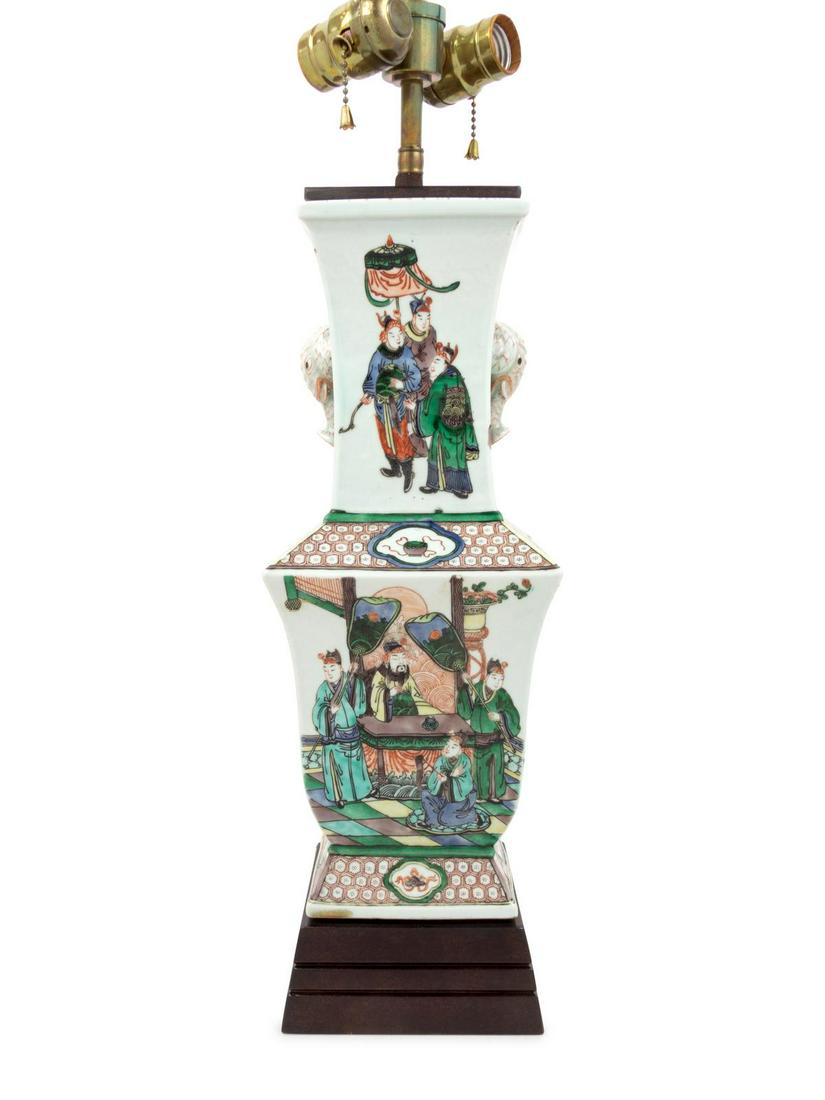 A Famille Verte Porcelain Vase: A Famille Verte Porcelain Vase Qing Dynasty, 19th Century mounted as a lamp. Height of porcelain 16 inches. Property from the Collection of Marion and Henry Bloch, Kansas City, Missouri