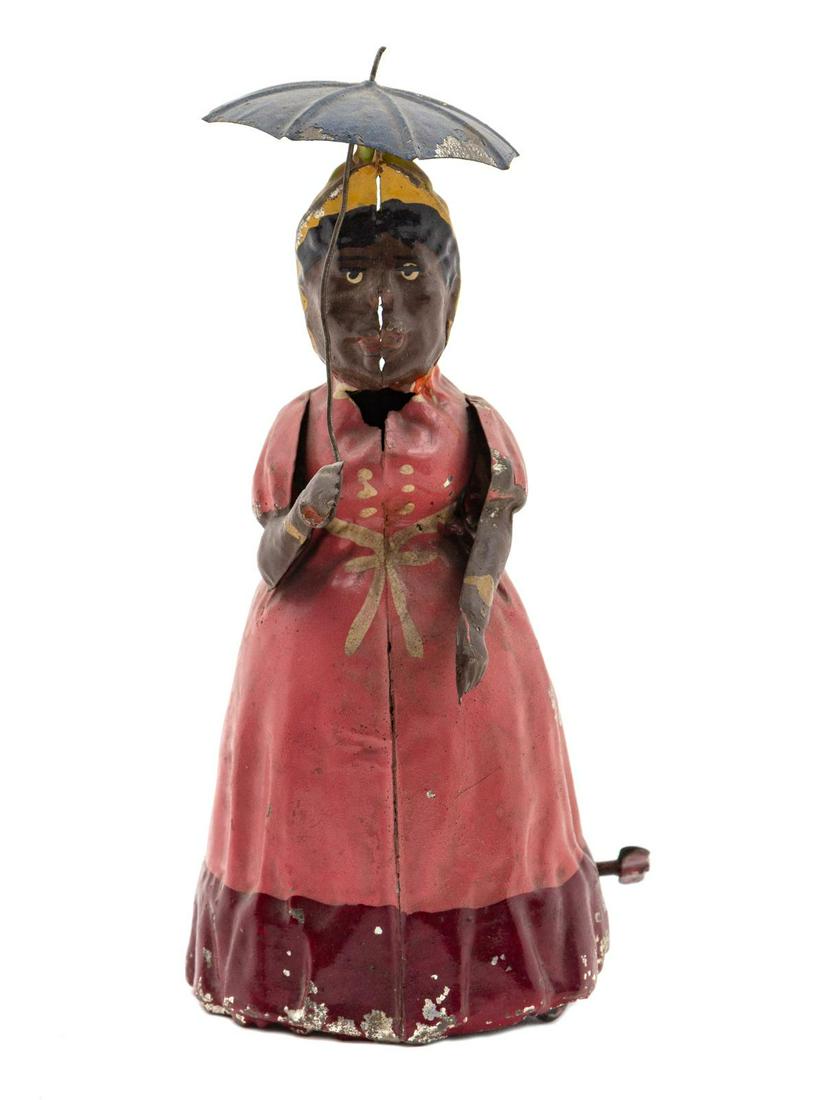 A German Tin "Parasol" Toy: A German Tin "Parasol" Toy Height 8 inches. Property from the Collection of Jonathan Hoffman, Chicago, Illinois