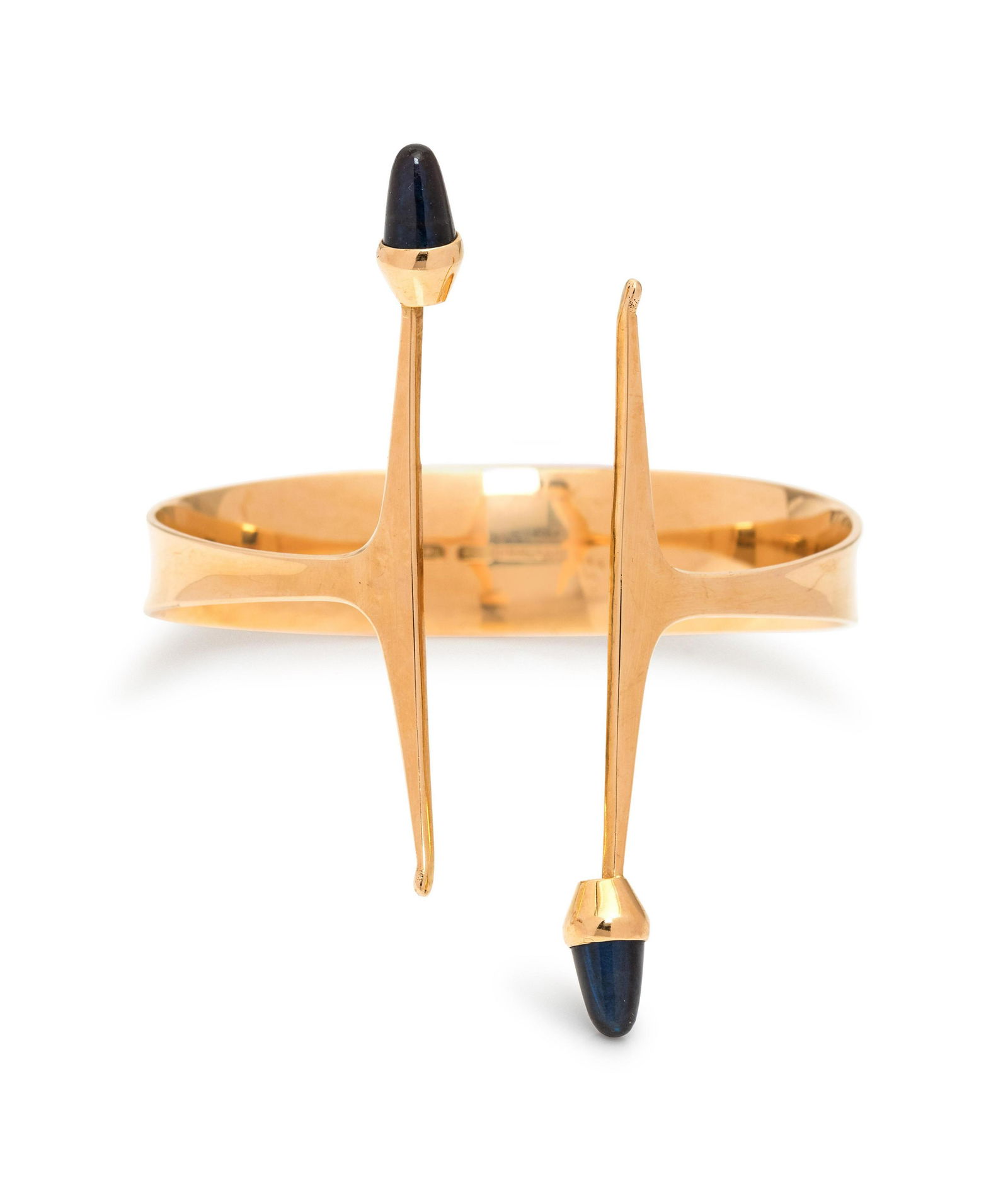 Elis Kauppi, Gold and Labradorite Cuff Bracelet: Elis Kauppi, Gold and Labradorite Cuff Bracelet containing two bullet cabochon cut labradorite. Stamp: 585 FINLAND. 21.27 dwts. Property from the Collection of Olga Garoufalis, Chicago, Illinois