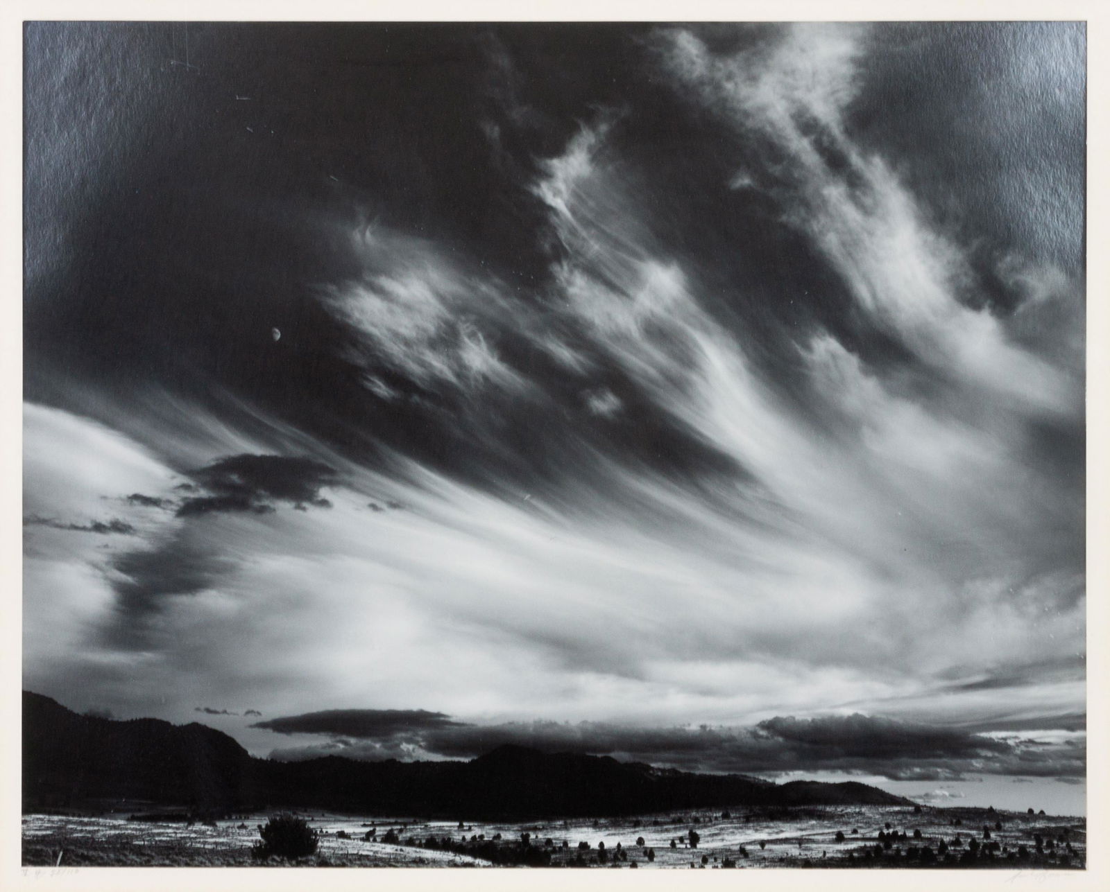 Ansel Adams (American, 1902-1984) Moon and Clouds, (1 of 2)