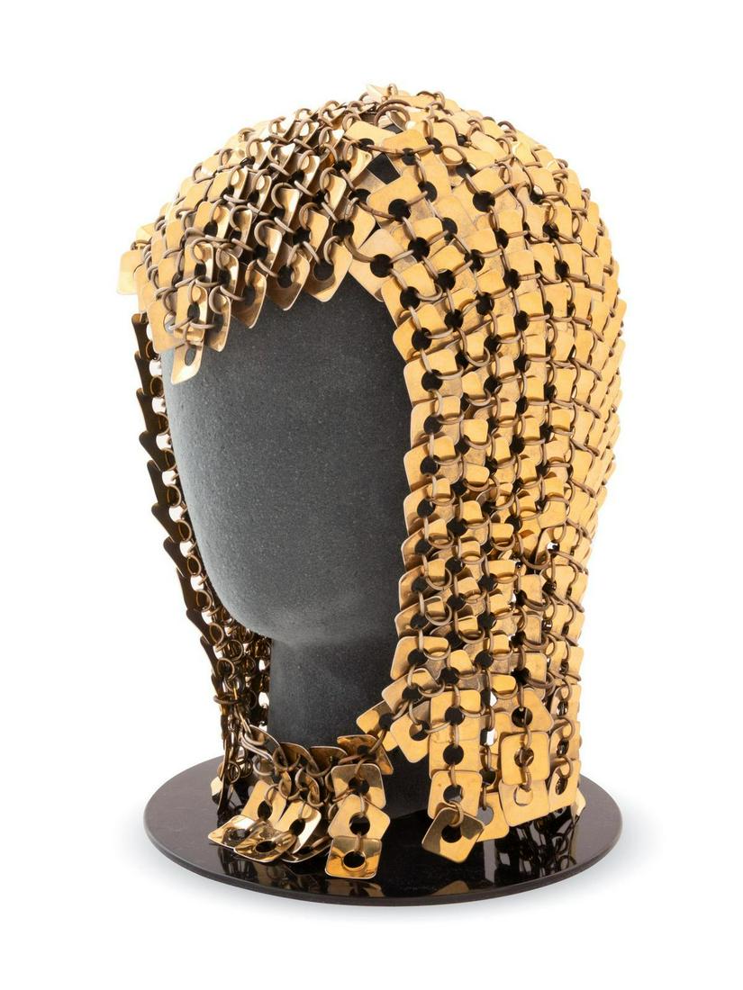 Paco Rabanne Brass Square Chainmail Hood, 1960-70s: Paco Rabanne Brass Square Chainmail Hood, 1960-70s The hood is made of square brass pieces with circles cut from the center. Each piece is held to the next one with a series of metal rings. The hood c