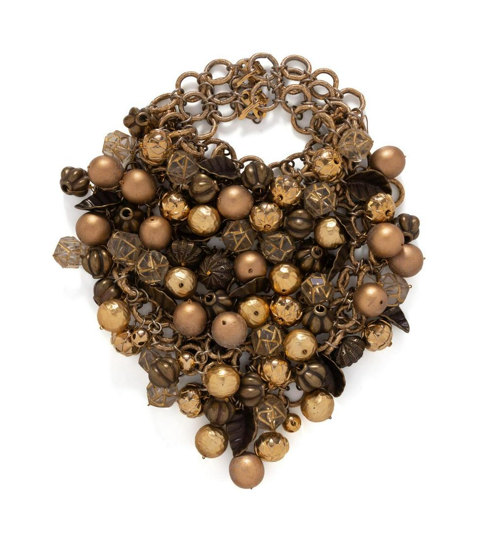 Paco Rabanne Choker: Paco Rabanne Choker Goldtone and dark bronze chain choker with assorted baubles and leaf-shaped pieces. Measurements: 11.5" L X 14" Circumference No label, attributed to Paco Rabanne. Property From th