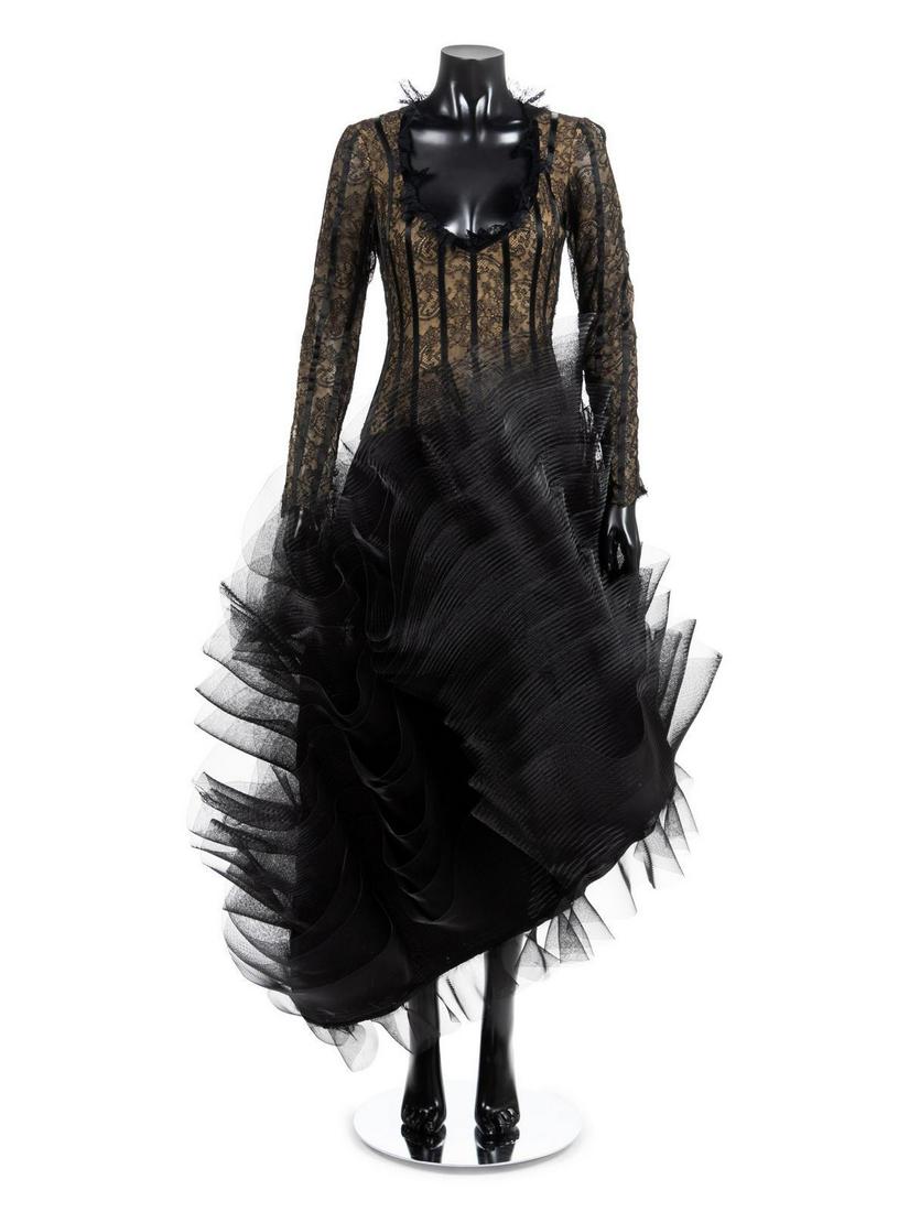 Louis Feraud Black Lace Evening Dress, 1990-2000s: Louis Feraud Black Lace Evening Dress, 1990-2000s Black lace and satin ribbon layered on nude crepe with ruffled synthetic horsehair on black satin evening dress. Label: Louis Feraud / Paris Approxima