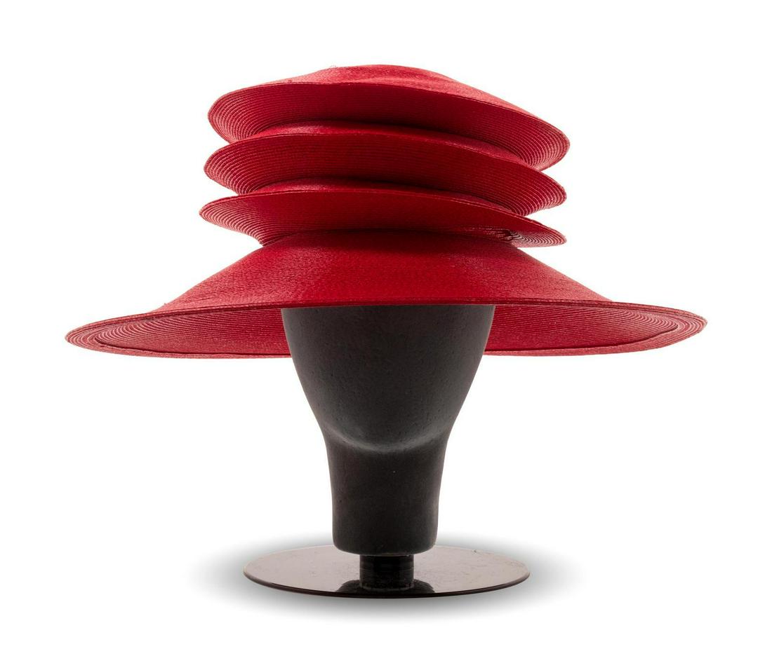 Two Kokin and One Frank Olive Red Hats, 1980-90s: Two Kokin and One Frank Olive Red Hats, 1980-90s The first: Frank Olive straw hat made with an accordion design. The second: Kokin leather cap with embelishment on the back hem. The third: Kokin hat w