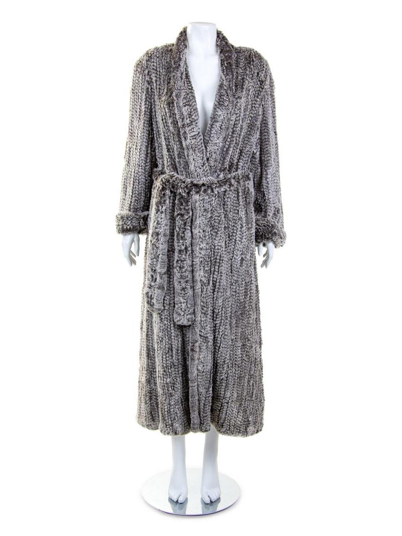 Trilogy Rabbit Fur Robe, 1990-2000s: Trilogy Rabbit Fur Robe, 1990-2000s Grey and white 'snow top' rabbit fur 'knit' into a bathrobe with shoulder pads, shawl collar and matching belt. Label: Trilogy With original retail labels listing t