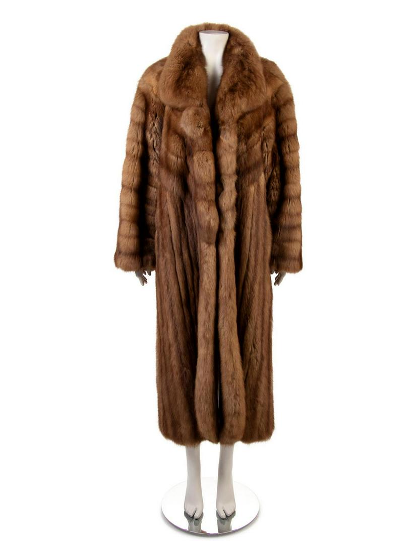 Michael Forrest Sable Coat, 1999-2000s: Michael Forrest Sable Coat, 1999-2000s Long brown sable coat with scalloped v neckline design across chest with stand collar, long sleeves, and hook and eyes down center front. Label: Michael Forrest 