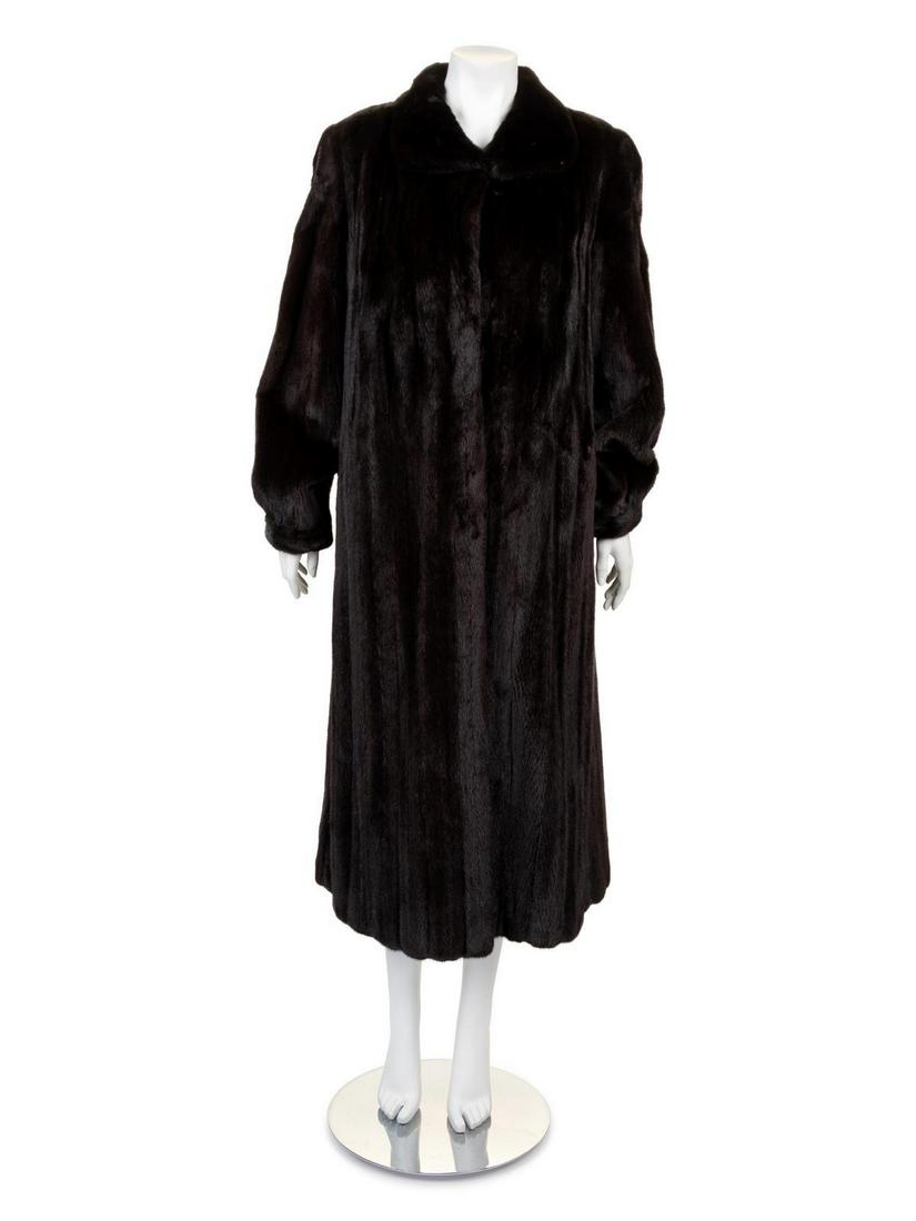 Nordstrom Brown Mink Coat, 1990-2000s: Nordstrom Brown Mink Coat, 1990-2000s Long brown dark mink coat, with fold down collar, long sleeves gathered into a cuff, with center front hook and eye closure. Label: Nordstrom Approximate Flat Mea