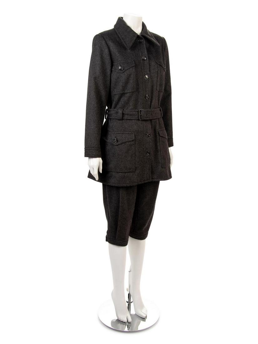 Yves Saint Laurent Safari Ensemble, 1980s-90s.: Yves Saint Laurent Safari Ensemble, 1980s-90s. Two piece gray wool and nylon ensemble of jacket and short pants. Top is made with a fold down collar, four patch pockets on the front, and self fabric b