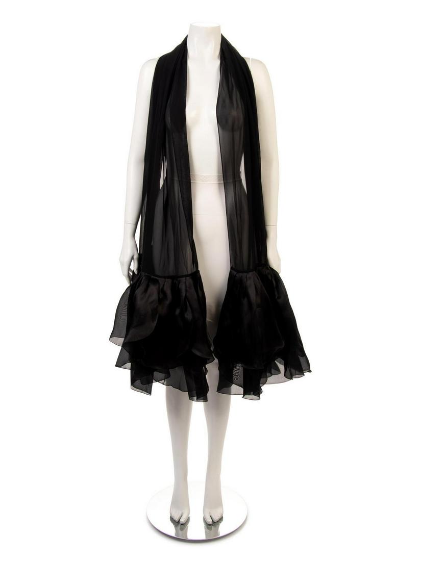Givenchy Couture Scarf, 1980-90s: Givenchy Couture Scarf, 1980-90s Long sheer black fabric scarf with pleated black fabric ends. Label: Givenchy Couture Paris Approximate Flat Measurements Across Front: Width: 26" Length: 92 "