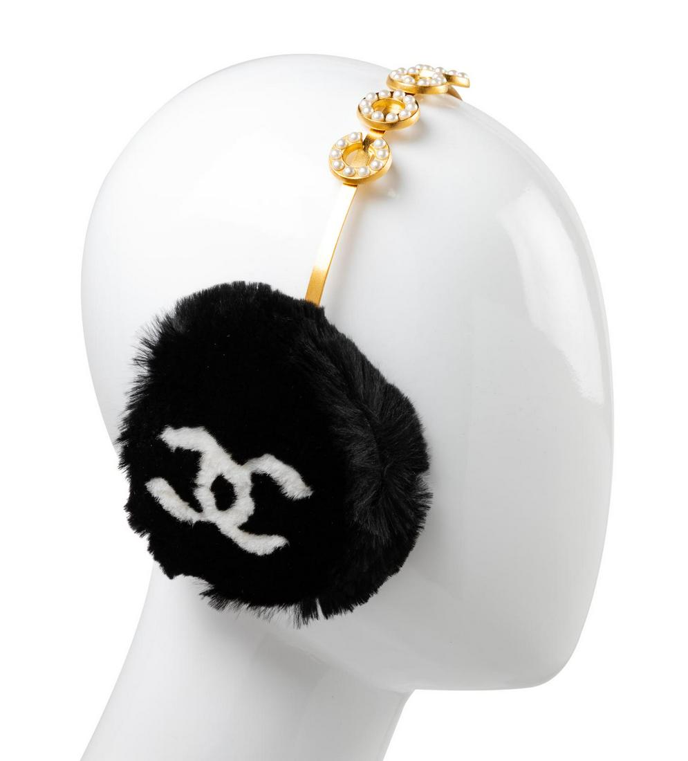 Chanel 'COCO' Fur Earmuffs, 2001: Chanel 'COCO' Fur Earmuffs, 2001 Black rabbit fur earmuffs with CC in white rabbit fur. Goldtone headband with 'COCO' in faux pearls. Original retail label lists price as $435.